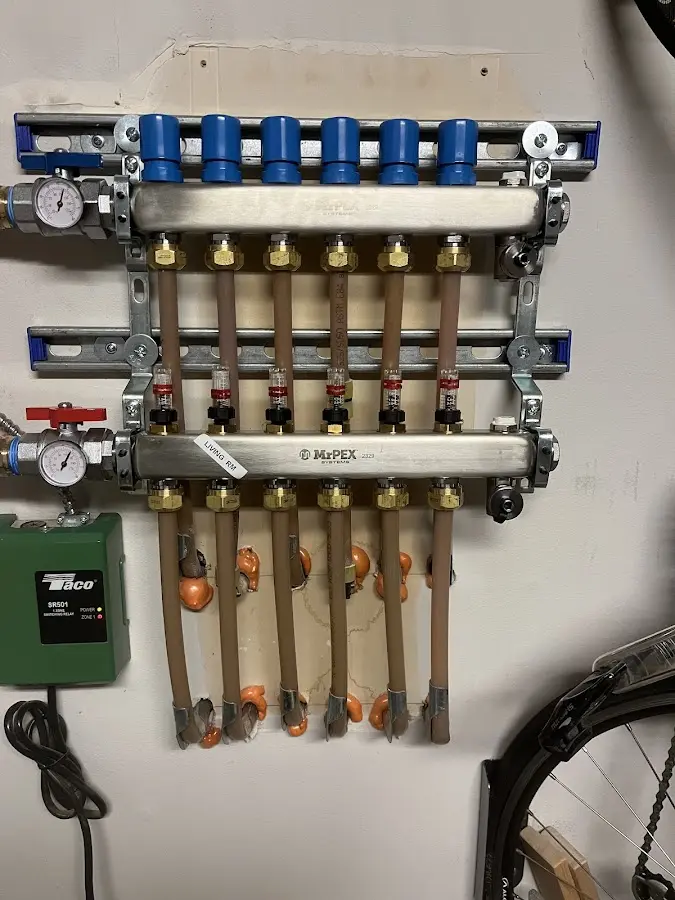 Plumber performing Gas Leak Detection at a residential property in Meadows Place